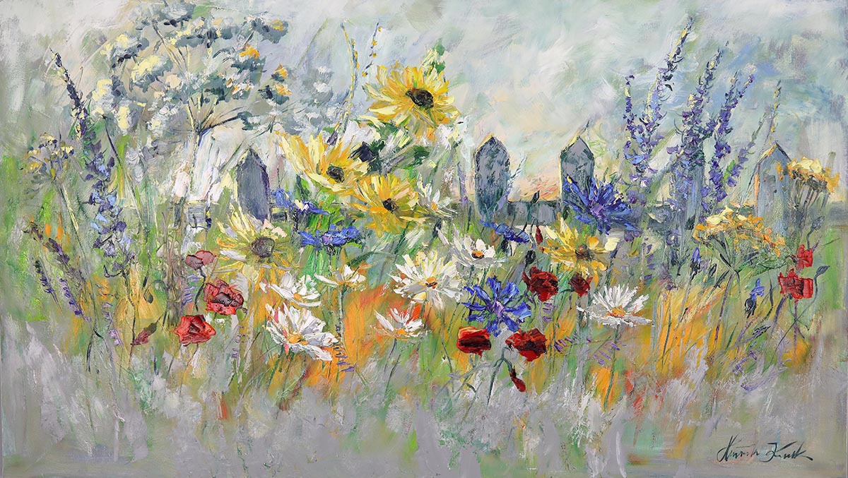 Dzika łaka przy płocie  